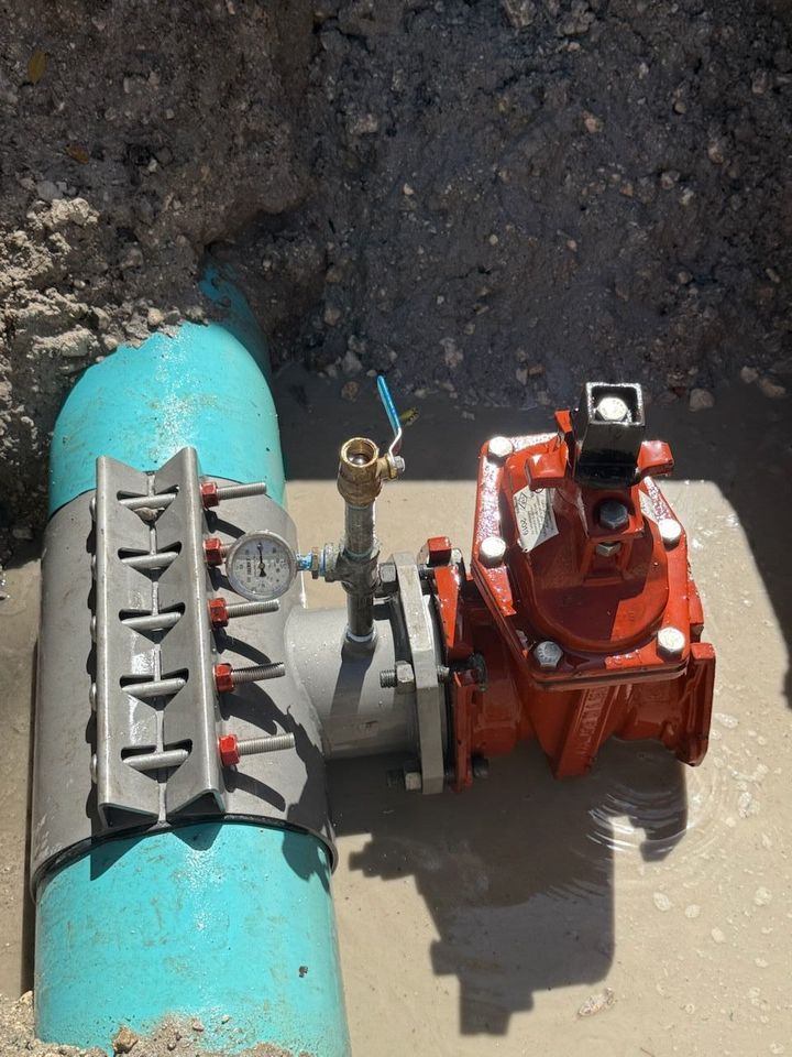 Water main with a gate valve and fittings