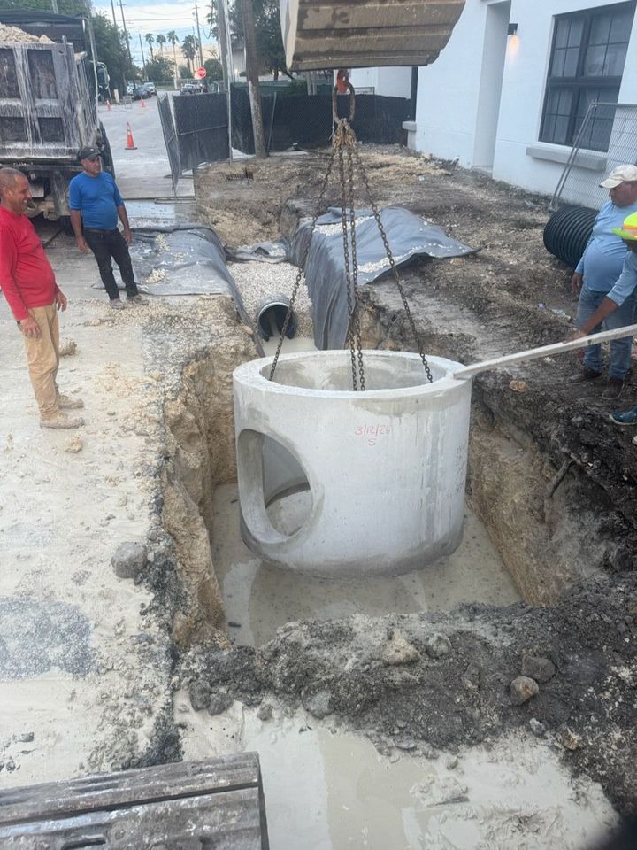 Precast structure being set in an excavation